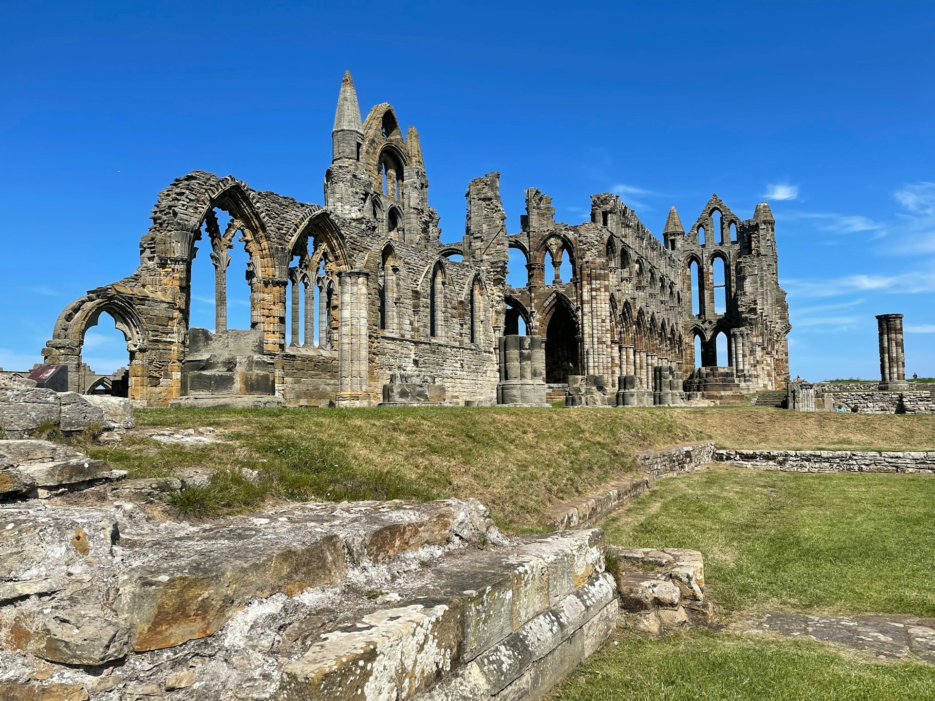 the ruins of an old castle on a sunny day